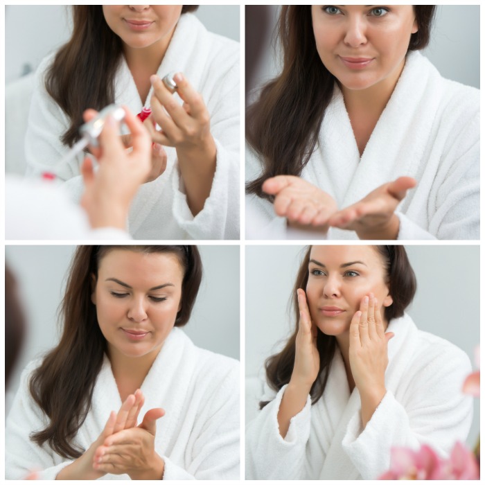 Applying Olay Regenerist Miracle Boost Youth Pre-Essence